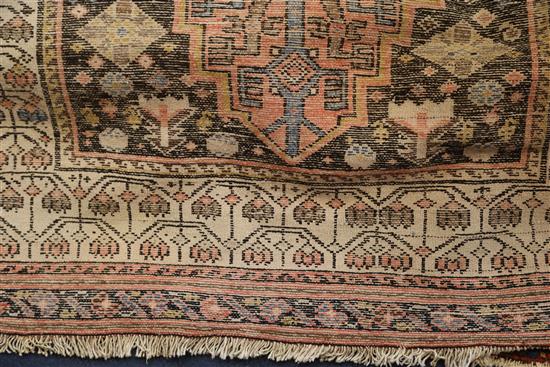 A Persian ivory ground runner, 13ft 2in by 4ft 4in.